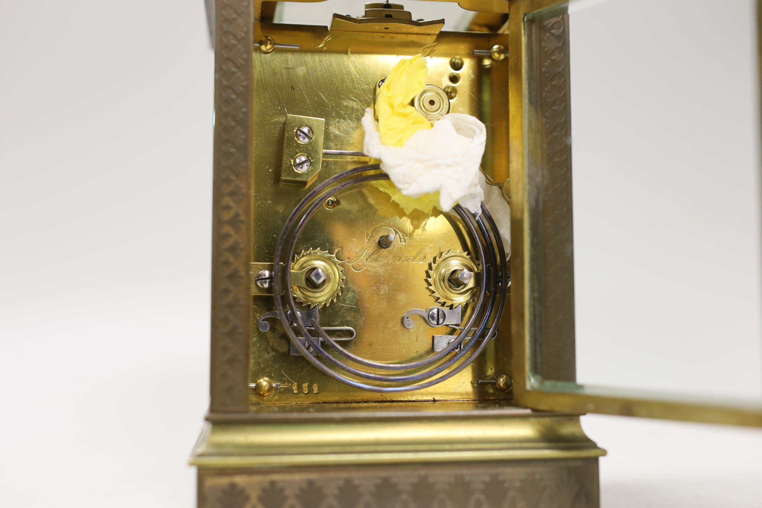 A French repeating brass carriage clock, retailed by Hanhart Calcutta, 16cm